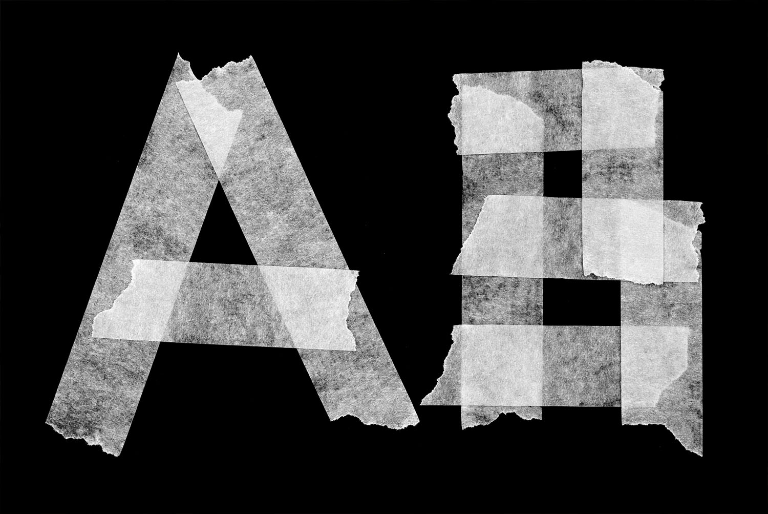 Tape White Font letters A and B Close-up of the Tape White Font letters A and B showing torn tape ends and overlapping strips