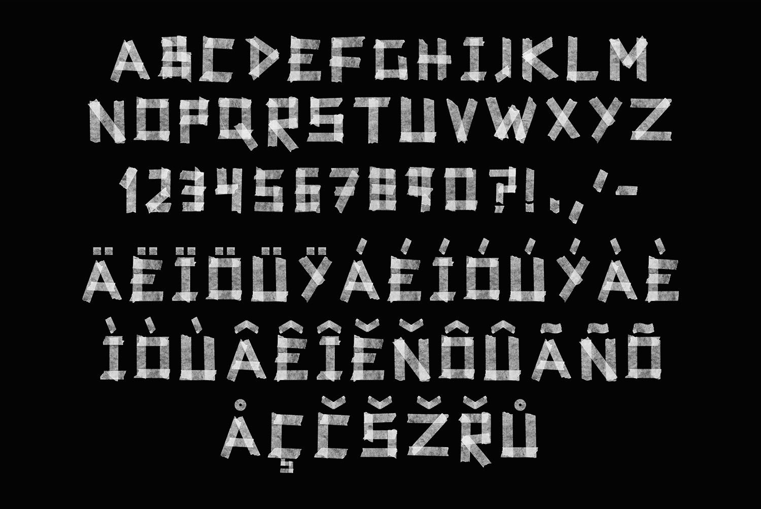 Tape White Font full alphabet Full alphabet of the Tape White Font with capitals, numerals, punctuation and accents on black