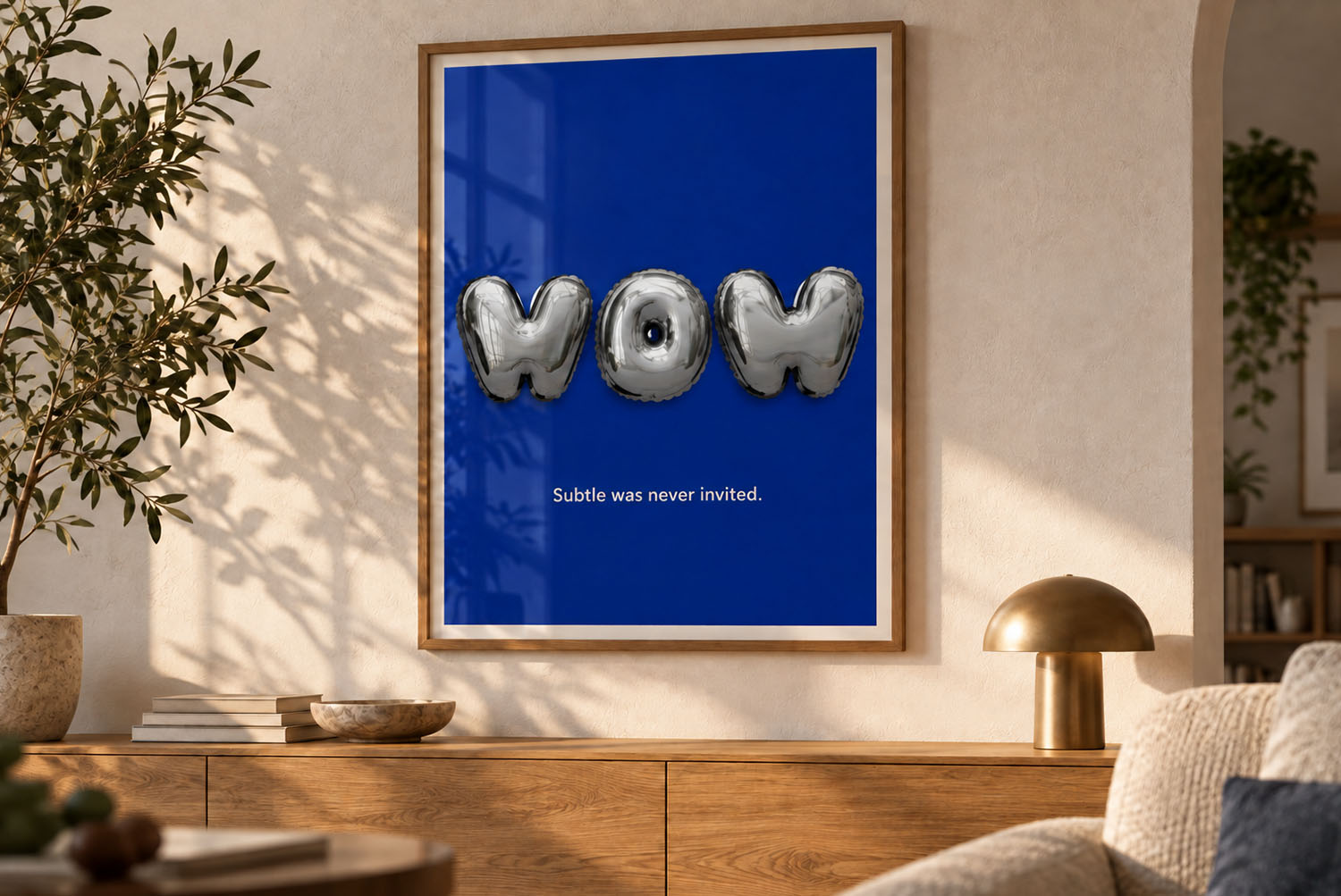 Chrome Balloon Font framed poster Framed poster with the word WOW in the Chrome Balloon Font above a sideboard
