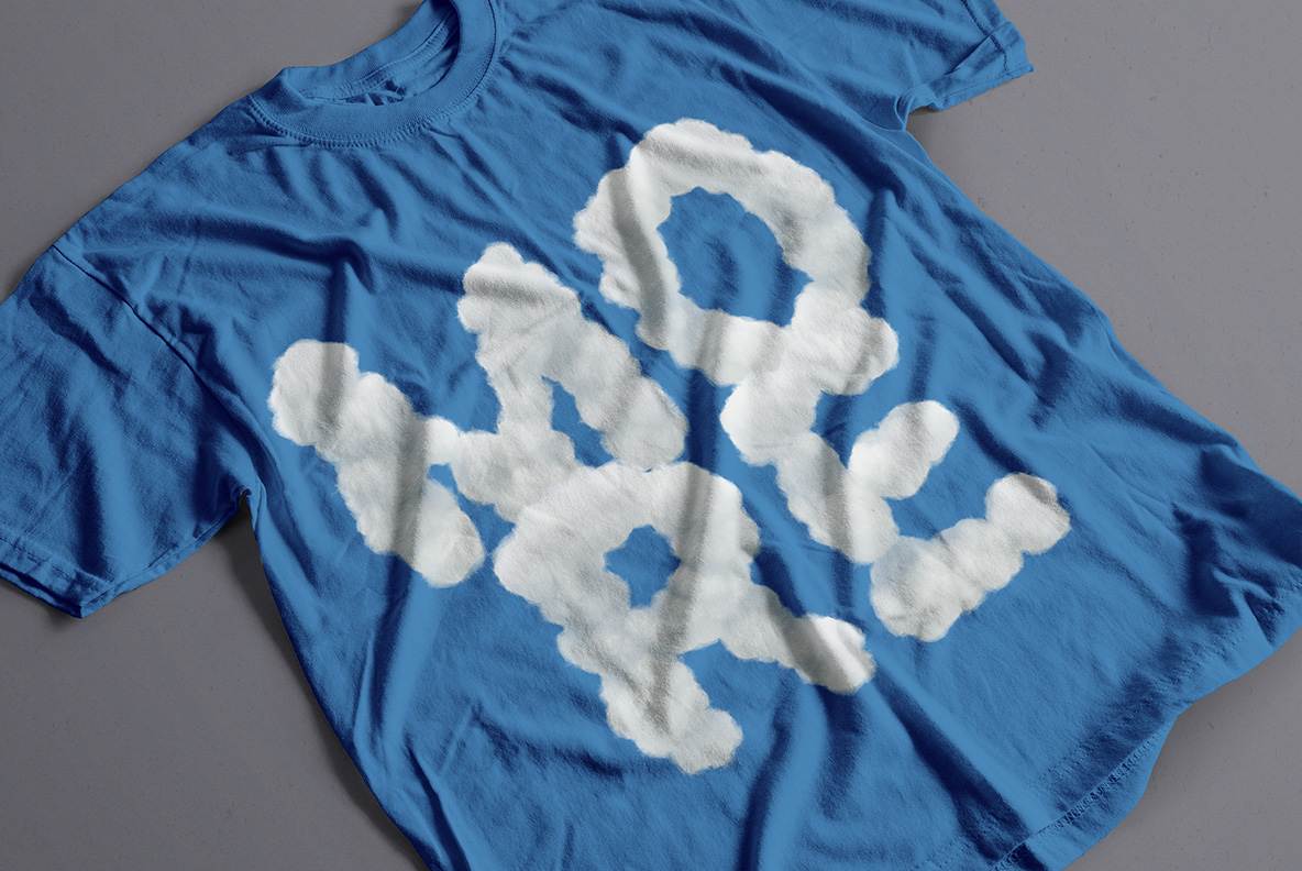 White Clouds Font OpenType Typeface SVG. T-shirt with sky clouds font text
