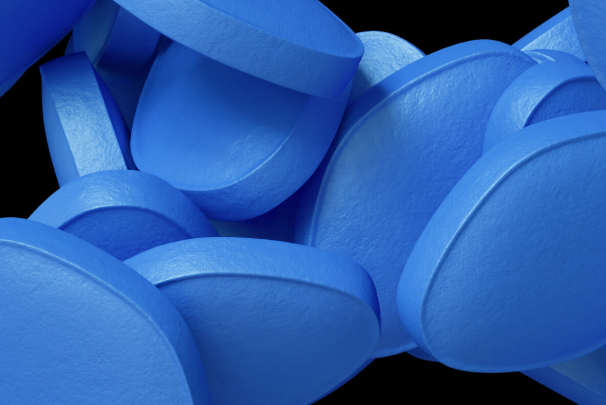 closeup of the blue Viagra pills Alphabet.
