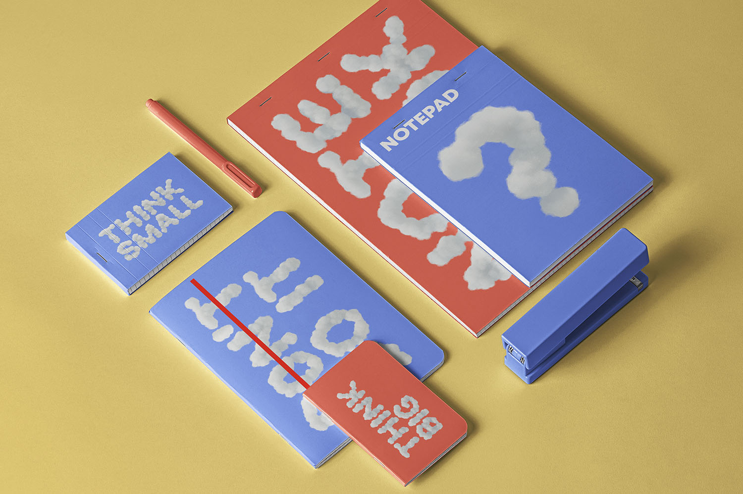 Stationery Set in the White Cloud Font Blue notepads and cards on a yellow desk printed with short phrases in the White Cloud Font
