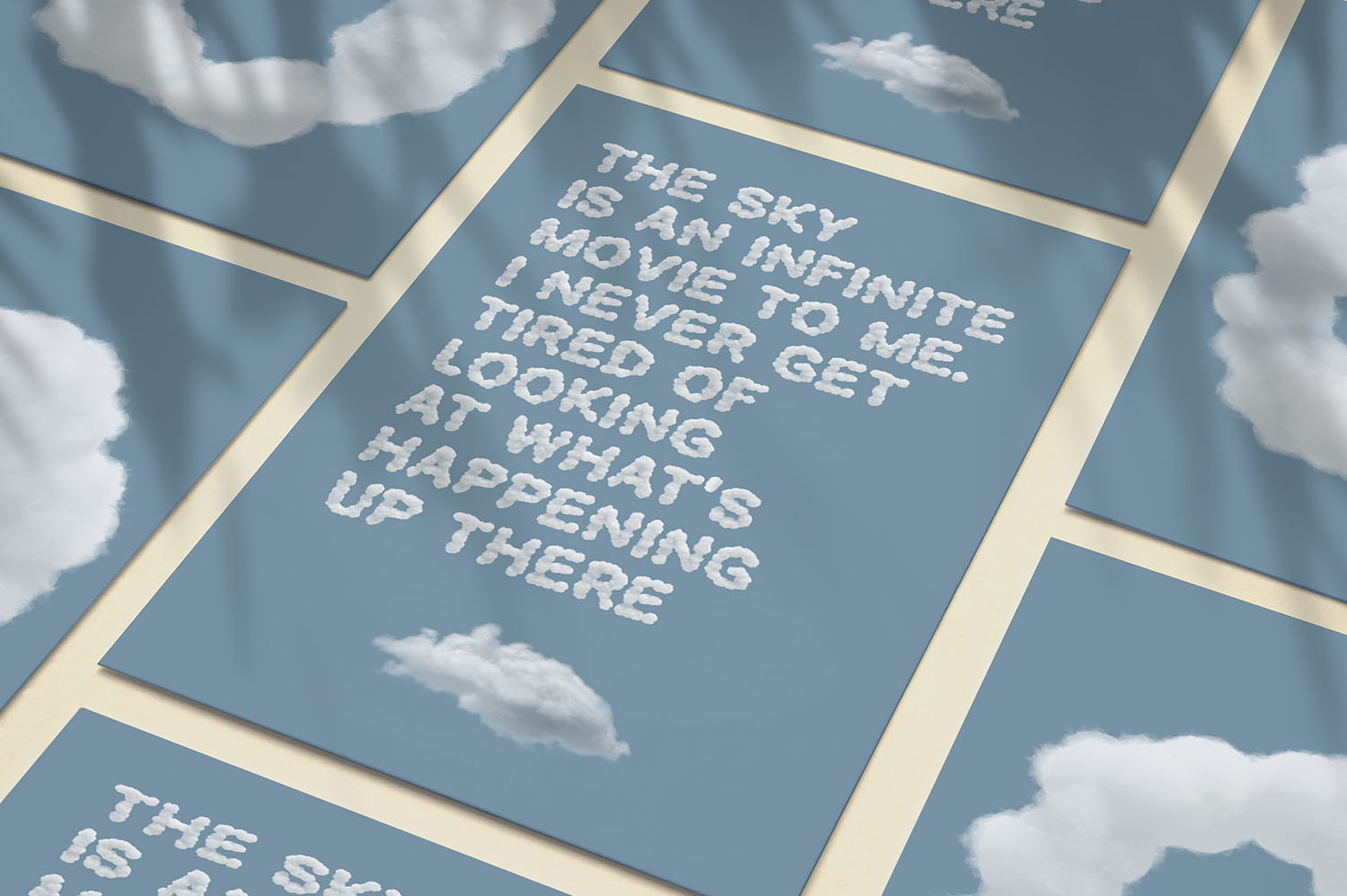 Sky Quote Posters in the White Cloud Font Repeated blue posters with a short sky-themed quote set in the White Cloud Font
