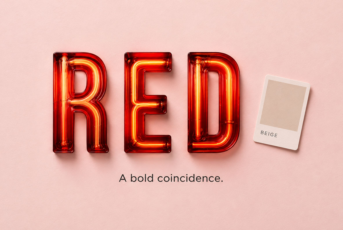 Urban Neon Font RED on pink RED in the Urban Neon Font on a pink wall with a beige colour swatch