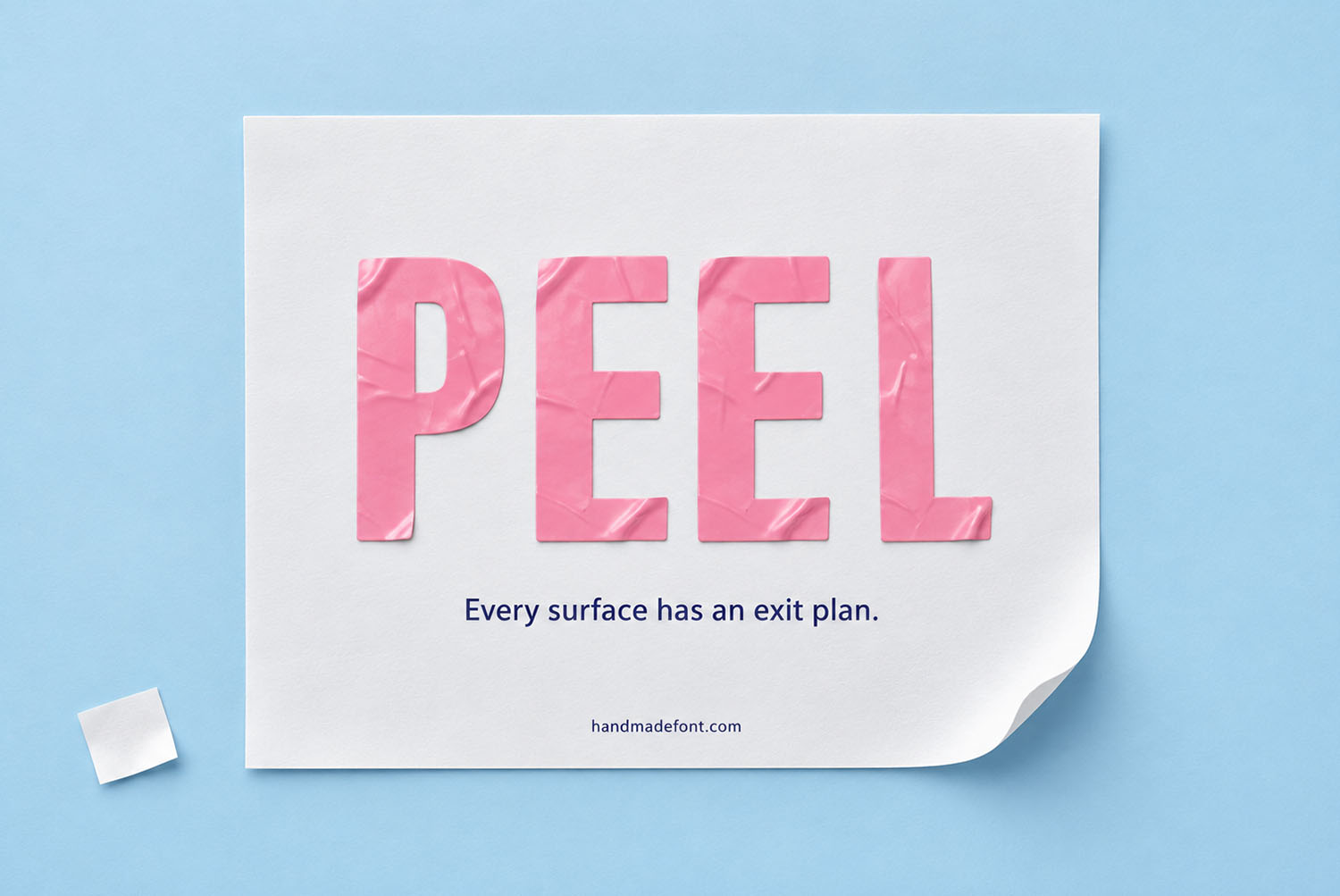 Pink Sticker Font Peel Lettering The word PEEL in the Pink Sticker Font on a curling white sheet over pale blue