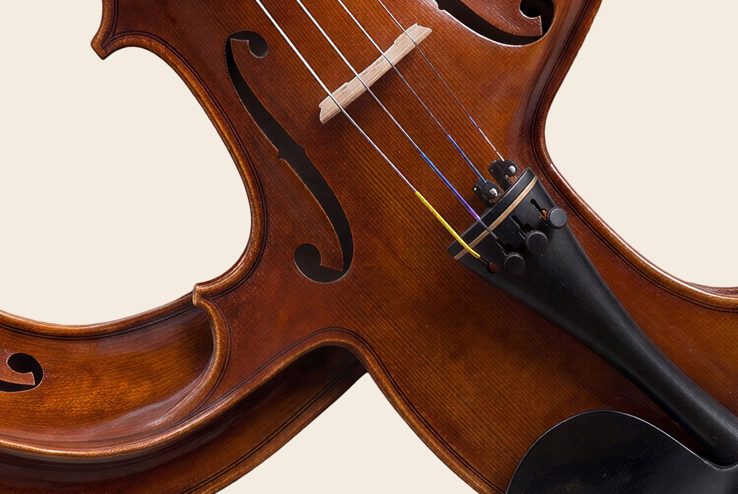 Violin Harmony Font Close-Up Close-up of a Violin Harmony Font letter showing strings, bridge and f-hole