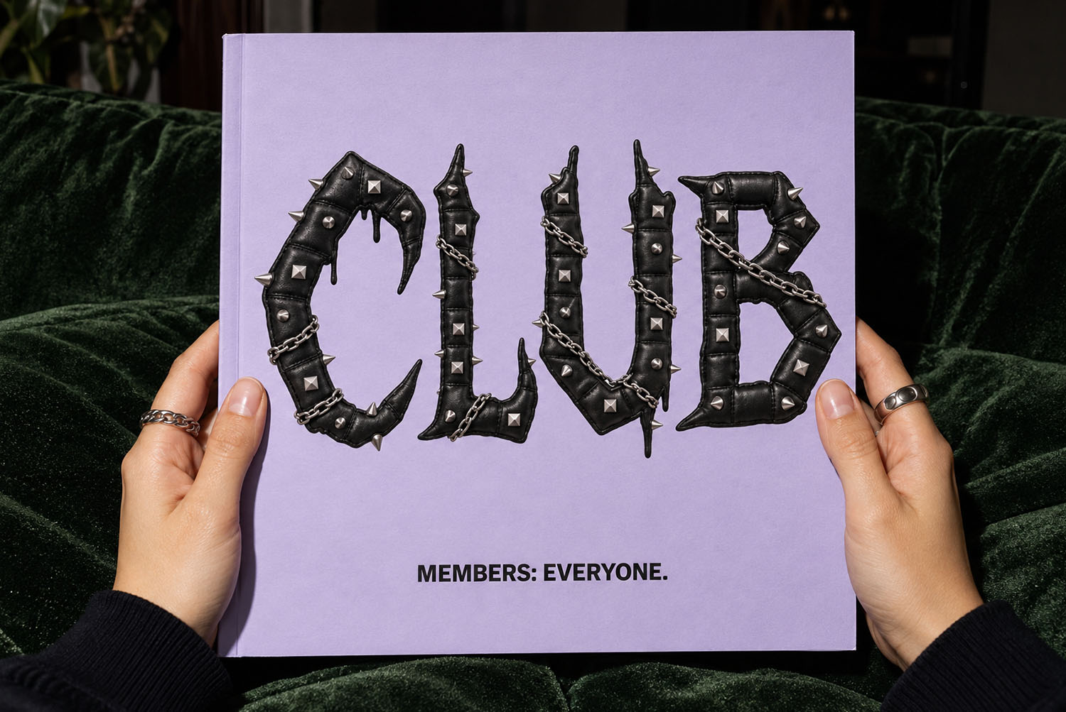 Gothic Punk Font CLUB book cover Lilac book held in two hands, its cover reading CLUB in the Gothic Punk Font