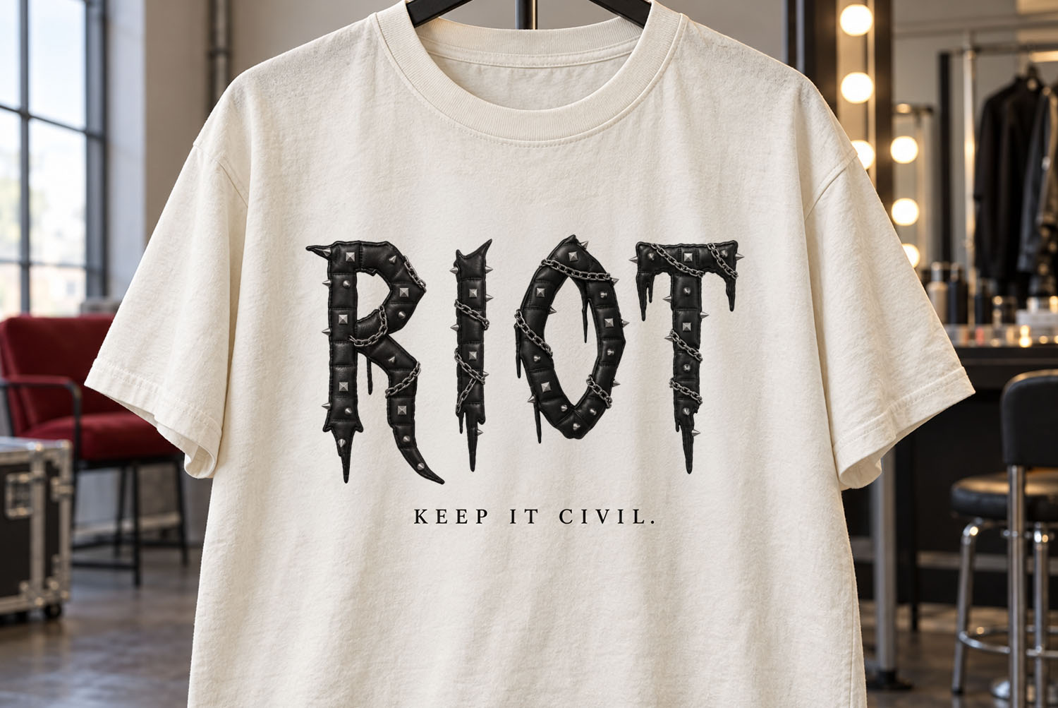 Gothic Punk Font RIOT t-shirt White t-shirt on a hanger printed with RIOT in the Gothic Punk Font