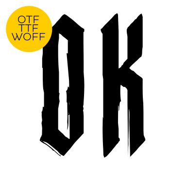 Black condensed blackletter capitals O and K of the Monastic Font with ink-worn edges